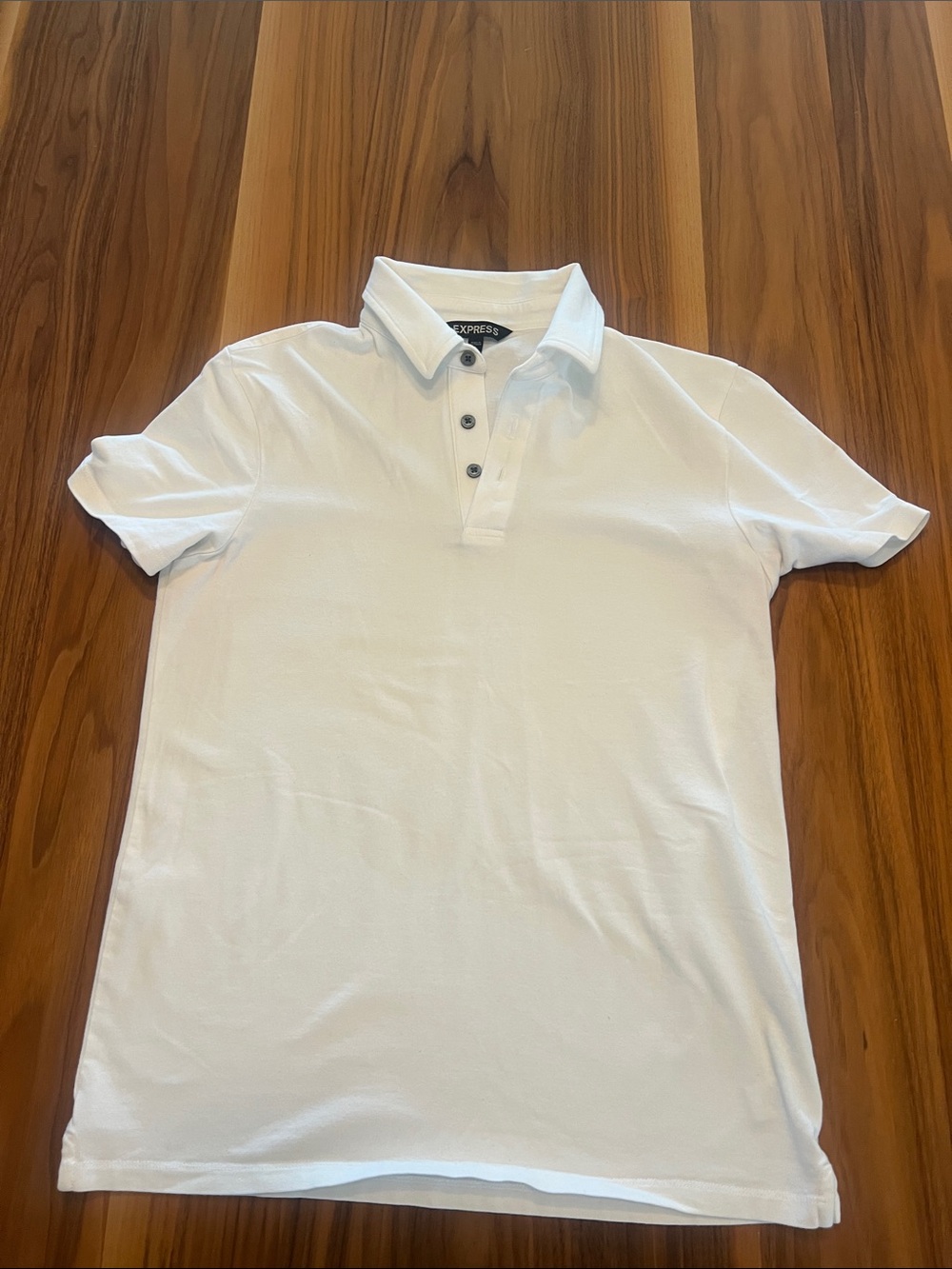 Express Men's White Polo with Three-Button Placket, size small.